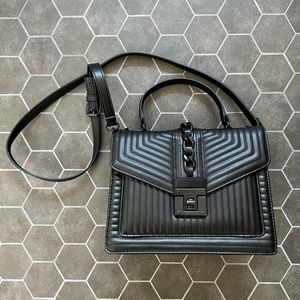 Pretty black Aldo crossbody with black hardware. Great condition.
